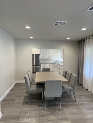 Dining room, Interior, Kitchen, Recessed Lighting, Stainless Steel Appliances, Wood Texture Flooring