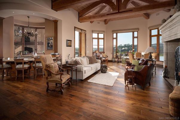 Chandelier, Dining room, Fireplace, Interior, Living room, Recessed Lighting, Wooden Beams, Wooden Ceilings, Wood Texture Flooring