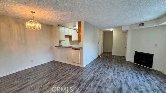 Chandelier, Empty room, Fireplace, Interior, Kitchen, Wood Texture Flooring