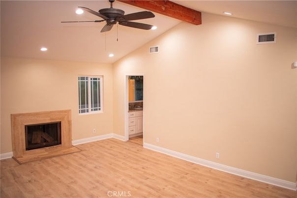 Empty room, Fireplace, Interior, Recessed Lighting, Wooden Beams, Wood Texture Flooring