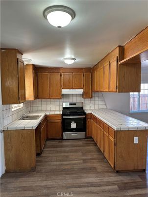 Interior, Kitchen, Tile Countertops, Wood Texture Flooring