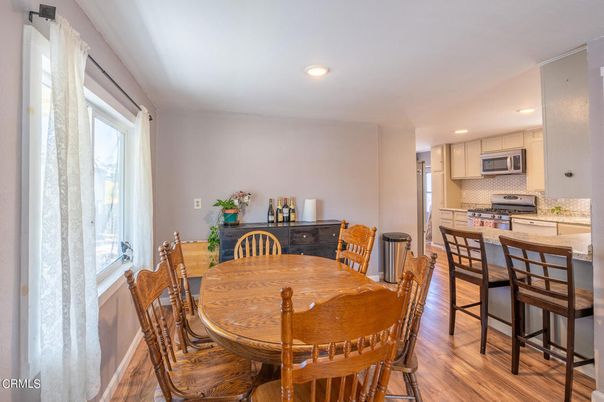 Dining room, Interior, Kitchen, Recessed Lighting, Stainless Steel Appliances, Wood Texture Flooring