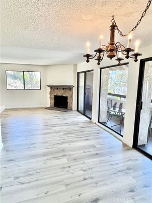 Chandelier, Empty room, Fireplace, Interior, Wood Texture Flooring