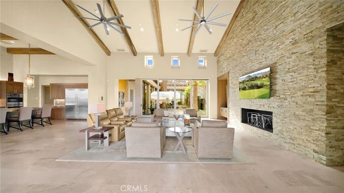 Fireplace, Interior, Kitchen, Living room, Pendant Lights, Recessed Lighting, Stainless Steel Appliances, Stone Walls, Wooden Beams