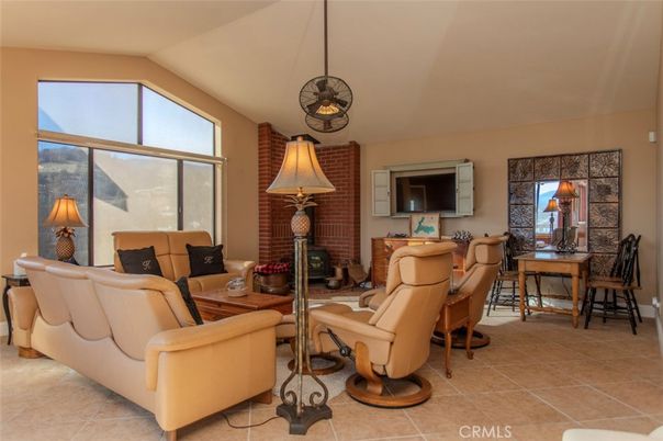 Dining room, Fireplace, Interior, Living room, Pendant Lights, Stone Walls