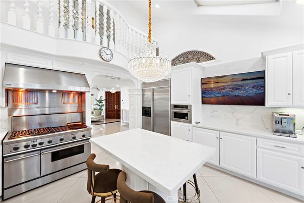 Chandelier, Interior, Kitchen, Marble Walls, Recessed Lighting, Stainless Steel Appliances