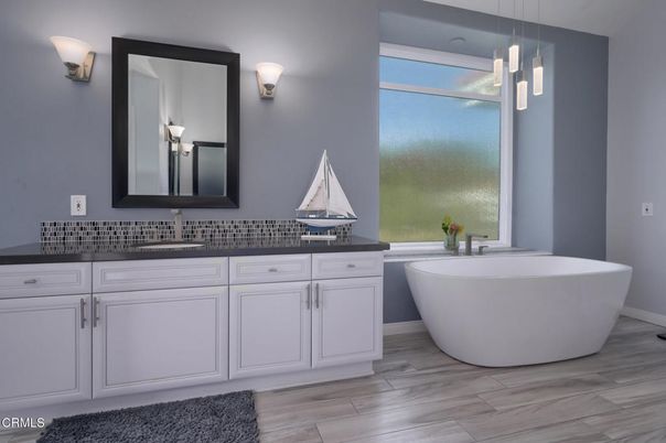 Bathroom, Dual Sink Vanities, Free Standing Baths, Interior, Pendant Lights, Wood Texture Flooring