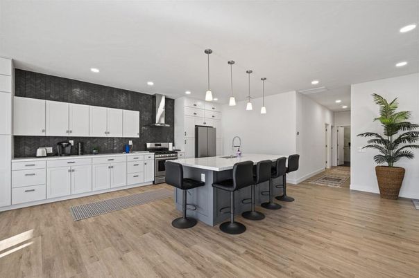 Interior, Kitchen, Pendant Lights, Recessed Lighting, Stainless Steel Appliances, Wood Texture Flooring