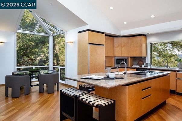 Dining room, Glass Ceilings, Interior, Kitchen, Recessed Lighting, Stainless Steel Appliances, Wood Texture Flooring