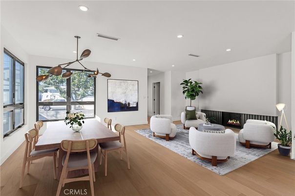 Dining room, Fireplace, Interior, Living room, Pendant Lights, Recessed Lighting, Wood Texture Flooring