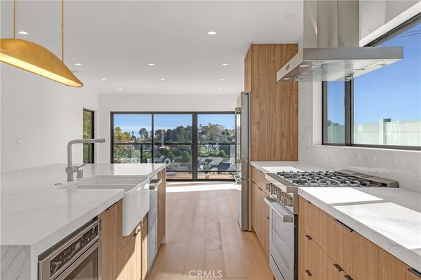 Interior, Kitchen, Pendant Lights, Recessed Lighting, Stainless Steel Appliances, Wood Texture Flooring