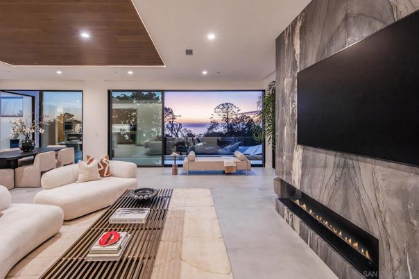 Fireplace, Interior, Living room, Marble Walls, Recessed Lighting, Water, Wooden Ceilings