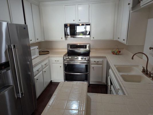 Interior, Kitchen, Tile Countertops, Wood Texture Flooring