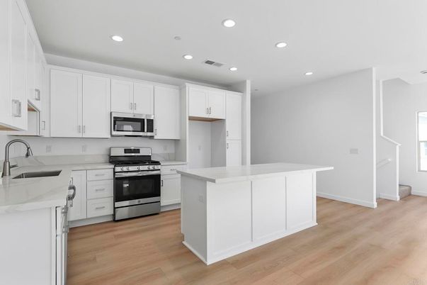 Interior, Kitchen, Recessed Lighting, Stainless Steel Appliances, Wood Texture Flooring