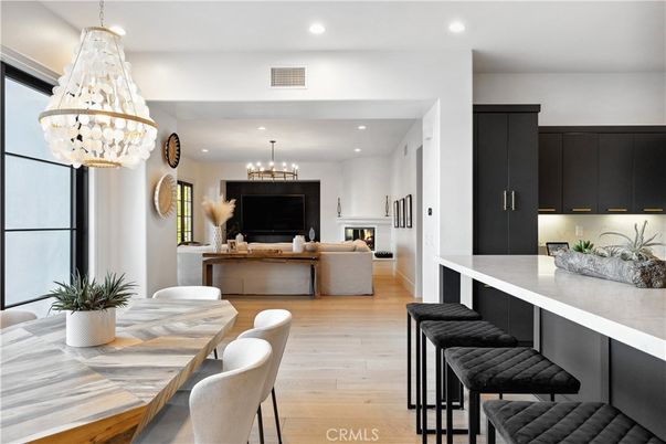 Chandelier, Dining room, Fireplace, Interior, Kitchen, Living room, Pendant Lights, Recessed Lighting, Wood Texture Flooring