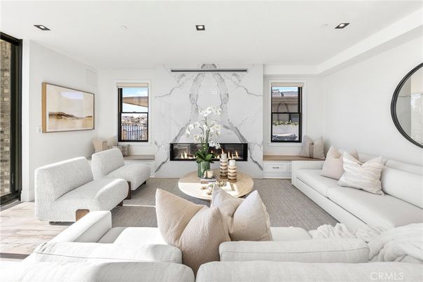 Fireplace, Interior, Living room, Marble Walls, Recessed Lighting, Wood Texture Flooring