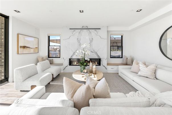 Fireplace, Interior, Living room, Marble Walls, Recessed Lighting, Wood Texture Flooring