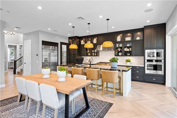 Dining room, Interior, Kitchen, Pendant Lights, Recessed Lighting, Stainless Steel Appliances, Wood Texture Flooring