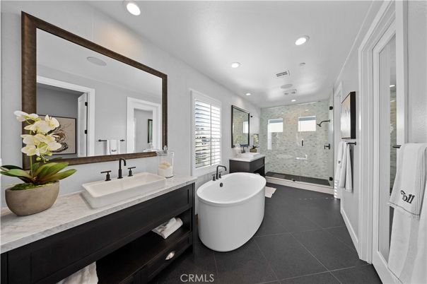 Bathroom, Dual Sink Vanities, Free Standing Baths, Glass Shower, Interior, Marble Walls, Recessed Lighting