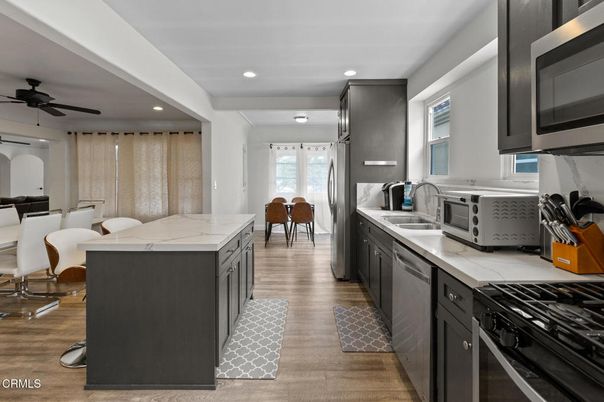 Dining room, Interior, Kitchen, Recessed Lighting, Stainless Steel Appliances, Wood Texture Flooring