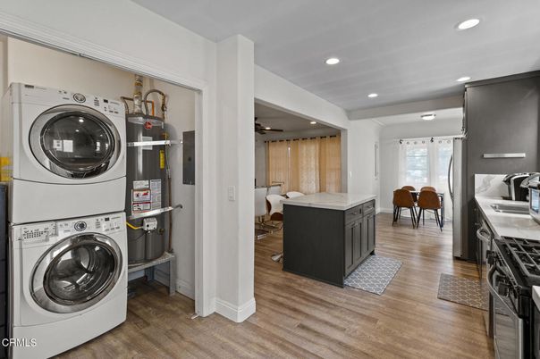 Dining room, Interior, Kitchen, Recessed Lighting, Utility Closets, Washer, Wood Texture Flooring
