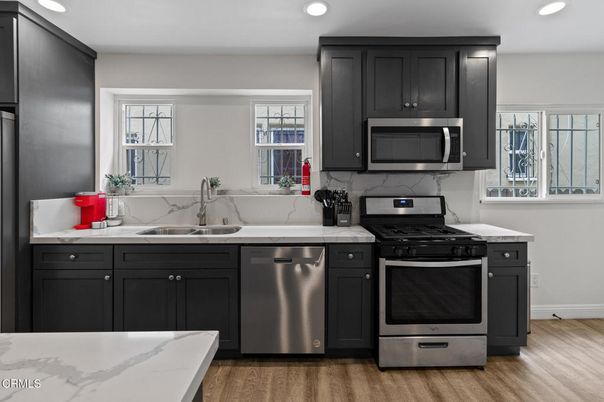 Interior, Kitchen, Recessed Lighting, Stainless Steel Appliances, Wood Texture Flooring