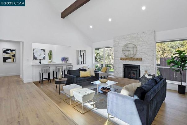 Fireplace, Interior, Living room, Recessed Lighting, Stone Walls, Wooden Beams, Wood Texture Flooring