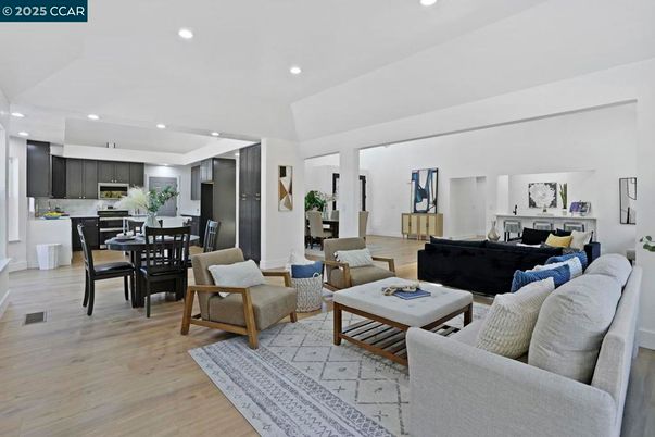 Dining room, Interior, Kitchen, Living room, Recessed Lighting, Stainless Steel Appliances, Wood Texture Flooring