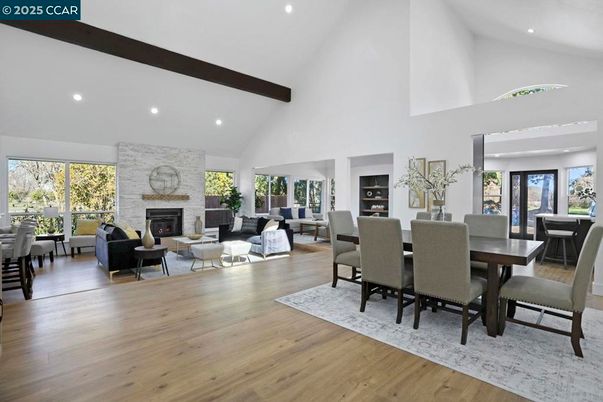 Dining room, Fireplace, Interior, Living room, Recessed Lighting, Stone Walls, Wooden Beams, Wood Texture Flooring