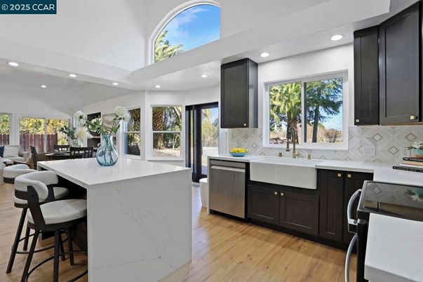 Dining room, Interior, Kitchen, Recessed Lighting, Stainless Steel Appliances, Wood Texture Flooring