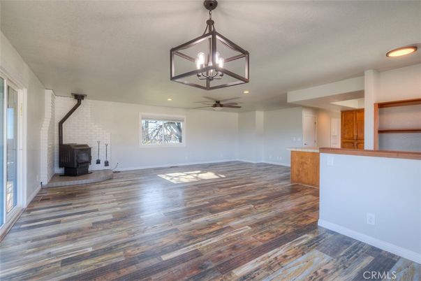 Empty room, Fireplace, Interior, Pendant Lights, Recessed Lighting, Wood Texture Flooring