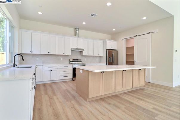 Interior, Kitchen, Recessed Lighting, Stainless Steel Appliances, Wood Texture Flooring
