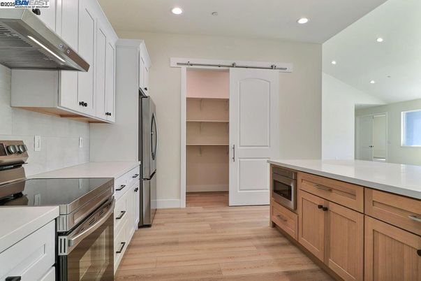 Interior, Kitchen, Recessed Lighting, Stainless Steel Appliances, Wood Texture Flooring