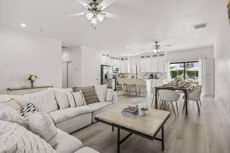 Dining room, Interior, Kitchen, Living room, Recessed Lighting, Stainless Steel Appliances, Wood Texture Flooring