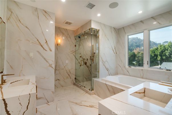 Bathroom, Dual Sink Vanities, Glass Shower, Interior, Marble, Marble Walls, Recessed Lighting