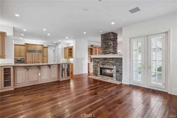 Empty room, Fireplace, Interior, Kitchen, Recessed Lighting, Wood Texture Flooring