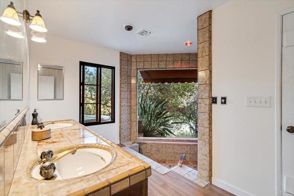 Bathroom, Dual Sink Vanities, Interior, Recessed Lighting, Tile Countertops, Wood Texture Flooring