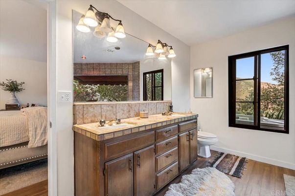 Bathroom, Bedroom, Dual Sink Vanities, Interior, Tile Countertops, Wood Texture Flooring