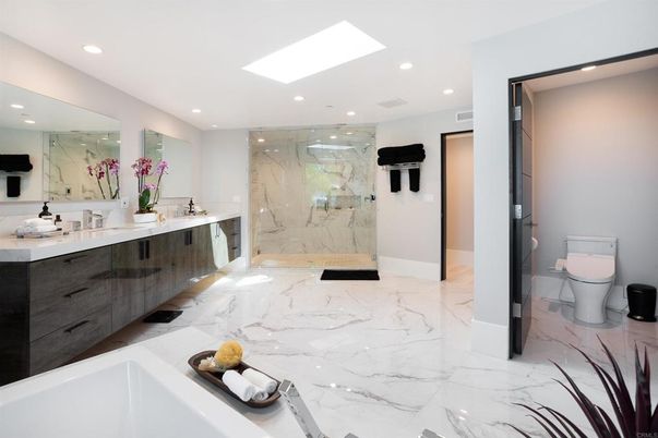 Bathroom, Dual Sink Vanities, Glass Shower, Interior, Marble, Marble Walls, Recessed Lighting