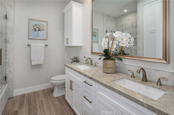 Bathroom, Dual Sink Vanities, Interior, Recessed Lighting, Wood Texture Flooring