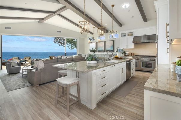 Interior, Kitchen, Living room, Pendant Lights, Recessed Lighting, Stainless Steel Appliances, Water, Wooden Beams, Wood Texture Flooring