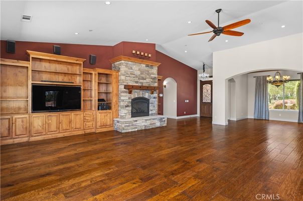 Chandelier, Empty room, Fireplace, Interior, Recessed Lighting, Wood Texture Flooring