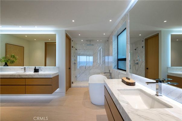 Bathroom, Dual Sink Vanities, Free Standing Baths, Glass Shower, Interior, Marble Walls, Recessed Lighting