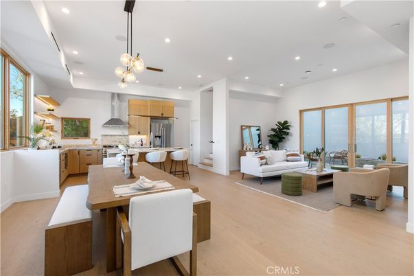 Dining room, Interior, Kitchen, Living room, Pendant Lights, Recessed Lighting, Stainless Steel Appliances, Water, Wood Texture Flooring