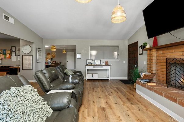 Home Theatre Room, Fireplace, Interior, Living room, Pendant Lights, Stone Walls, Wood Texture Flooring