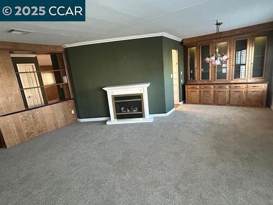 Chandelier, Empty room, Fireplace, Interior
