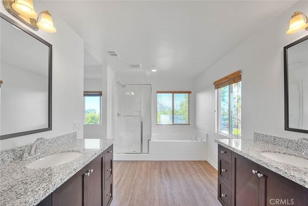Bathroom, Dual Sink Vanities, Glass Shower, Interior, Wood Texture Flooring