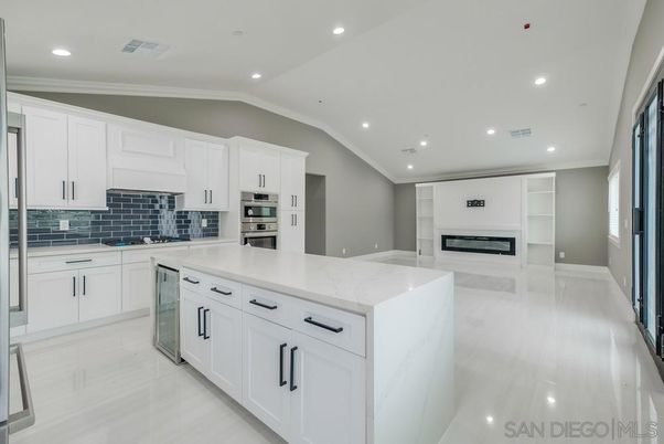 Fireplace, Interior, Kitchen, Recessed Lighting, Stainless Steel Appliances
