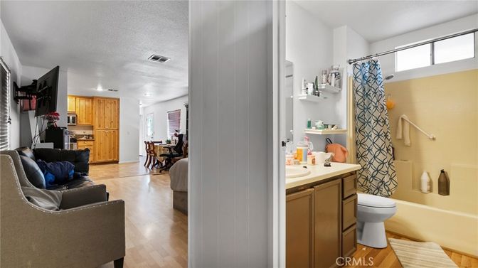 Bathroom, Dining room, Interior, Kitchen, Living room, Recessed Lighting, Wood Texture Flooring