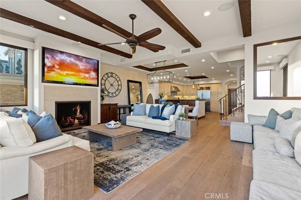 Fireplace, Interior, Kitchen, Living room, Pendant Lights, Recessed Lighting, Stainless Steel Appliances, Wooden Beams, Wood Texture Flooring